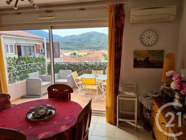 Afficher la photo en grand Appartement F3 à vendre - 3 pièces - 75.0 m2 - LE BOULOU - 66 - LANGUEDOC-ROUSSILLON - Century 21 Agence Des Cerisiers